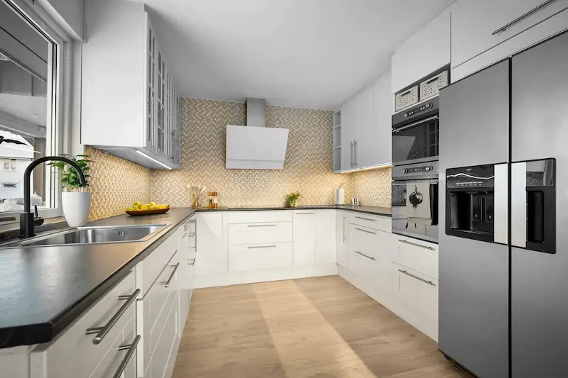 Modern Orange County kitchen with stainless steel appliances serviced by Royal Appliance Services